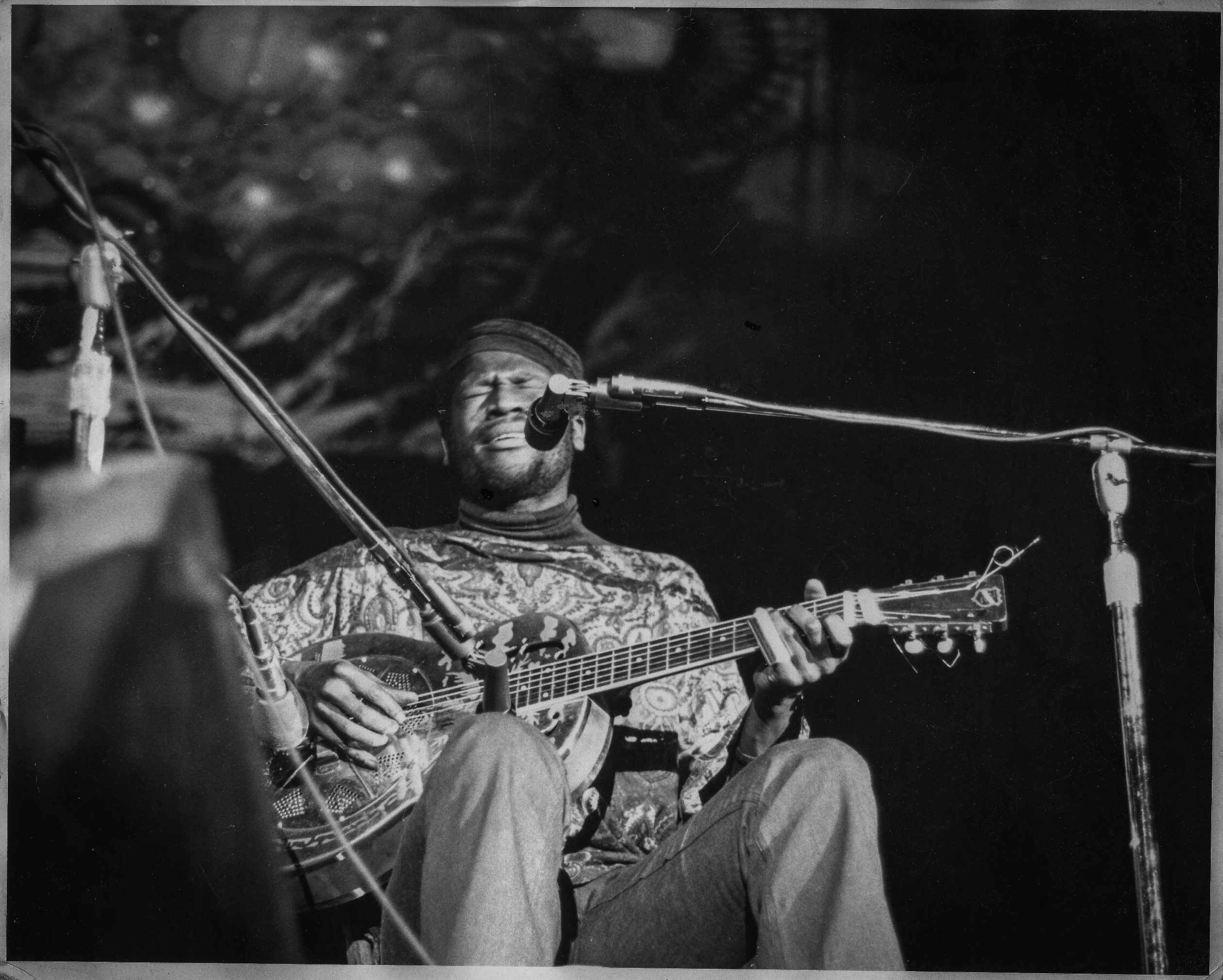 Taj Mahal playing a National Steel guitar, 1973.